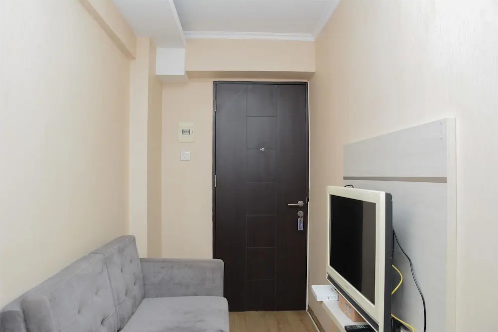 Cozy Living with Modern Design 1BR Kebagusan City Apartment By Travelio