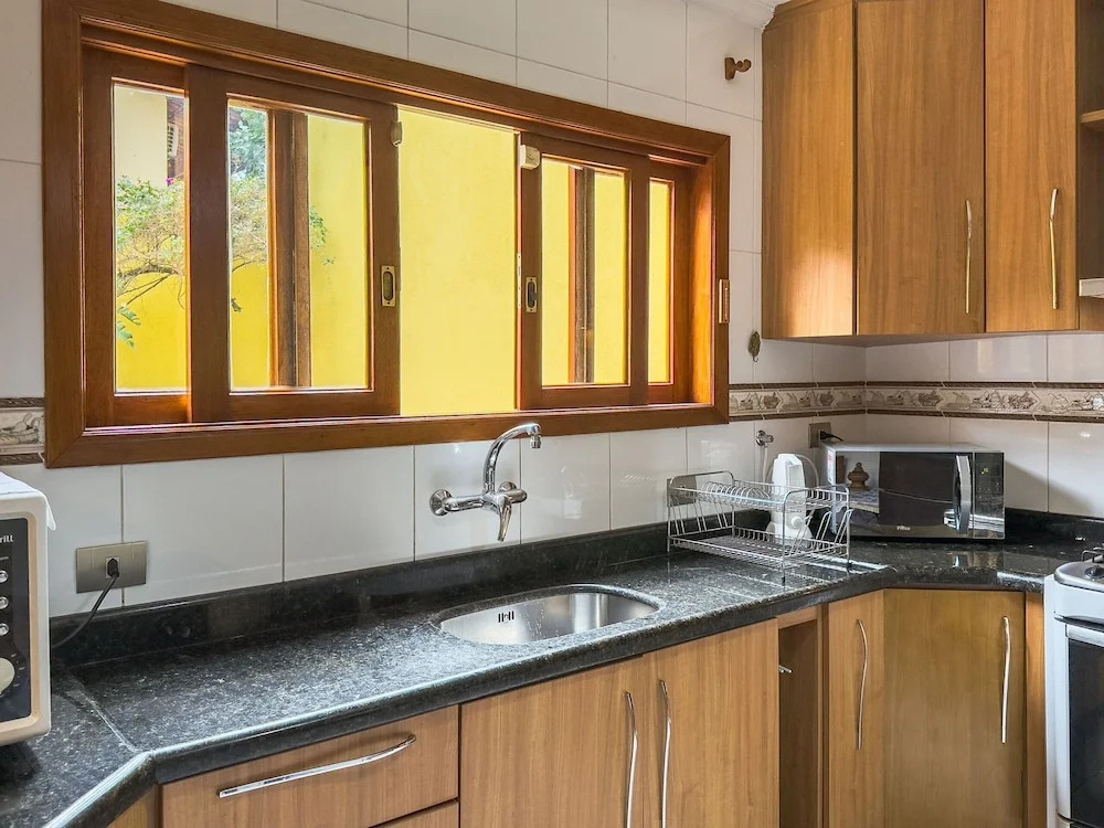 Espaço gourmet e home-office na Granja
