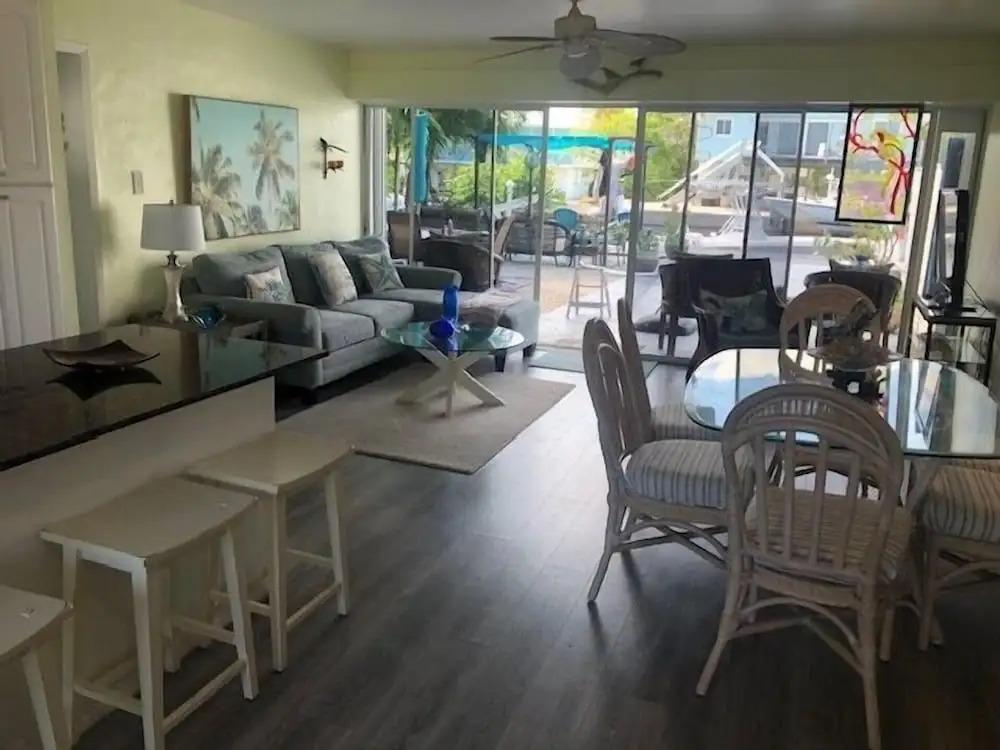 Beautiful Upper Unit With Dockage, Pool And Hot Tub 2 Bedroom Home by RedAwning
