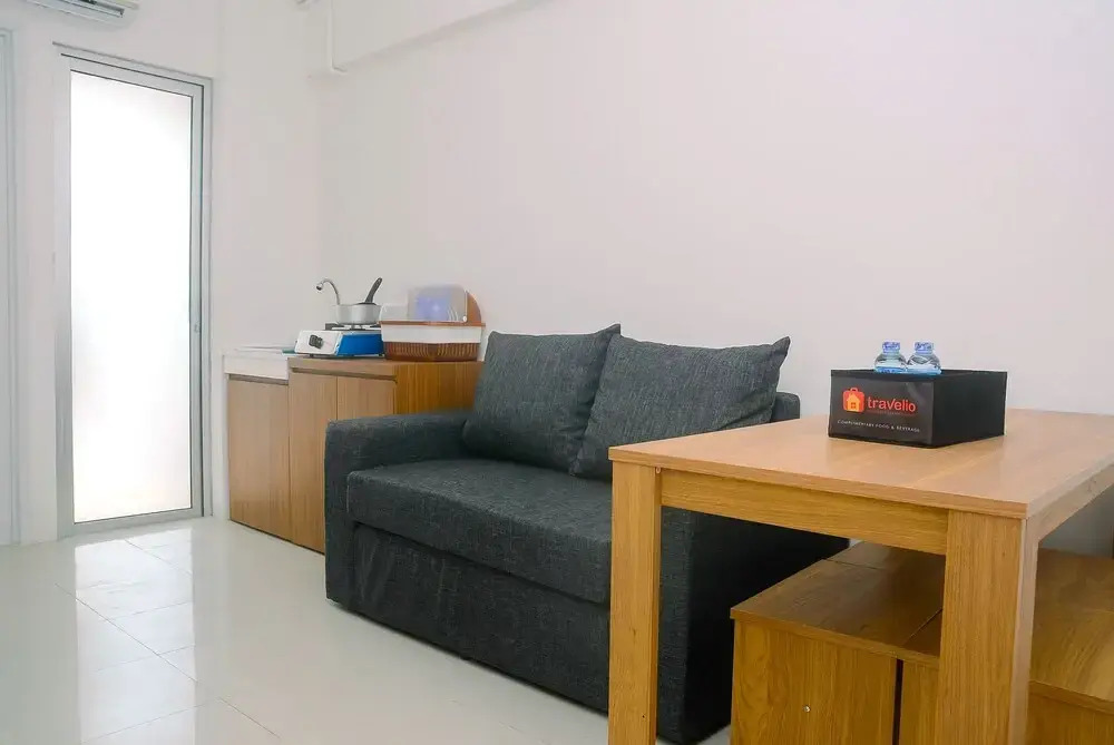 2BR Minimalist Bassura City Apartment By Travelio