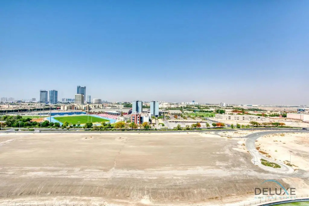 Vivid 2BR at Canal Residences West Dubai Sports City by Deluxe Holiday Homes