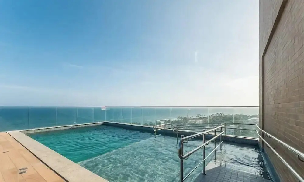 Sua estadia com conforto em prédio c/ piscina e a Praia a Poucos Passos - PSPs