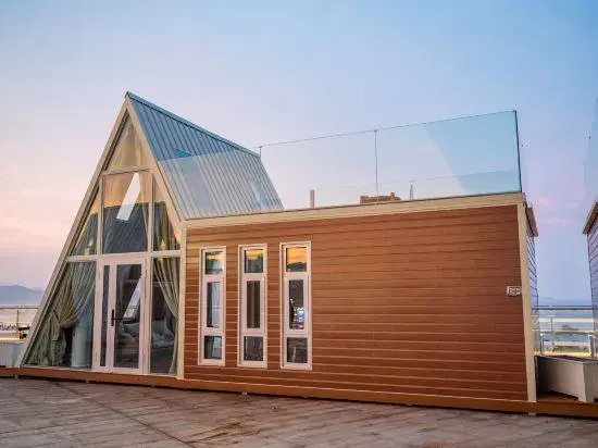 Qingdao Jinshatan Muhai Resort Homestay (Phoenix Voice Grand Theater Branch)