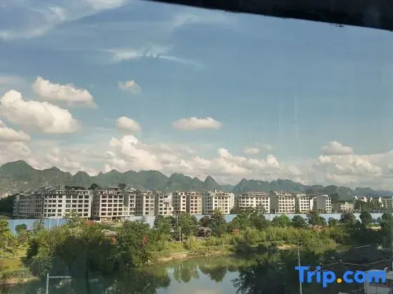 Yeste Hotel (Du'an High - speed Railway Station Binjiang Zhuangyuan Food Street Branch)