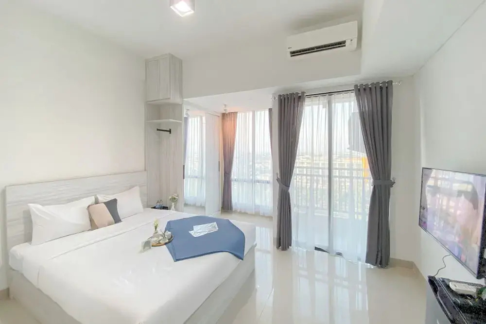 Simple White Designed Studio At Lrt City Bekasi Apartment
