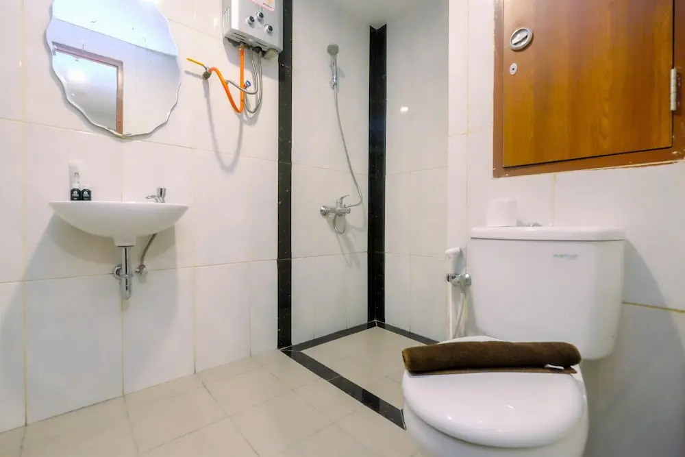 Cozy 1BR without Living Room Grand Kamala Lagoon Apartment By Travelio