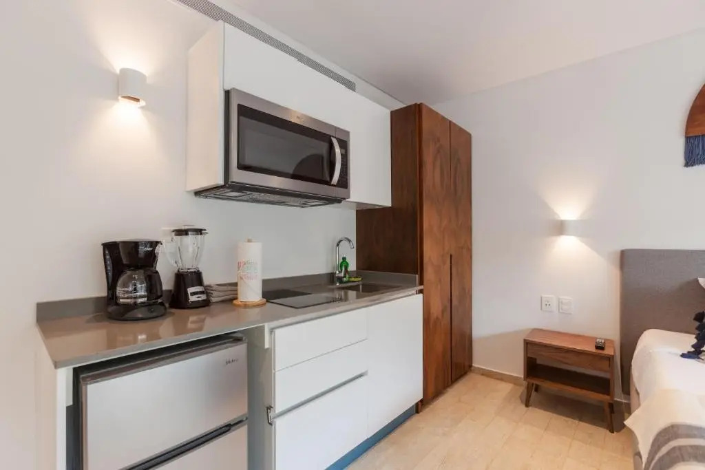 LAGUNAS CENTRAL PARK High tech studio with backyard / Pool & Gym at condo! 2 pax