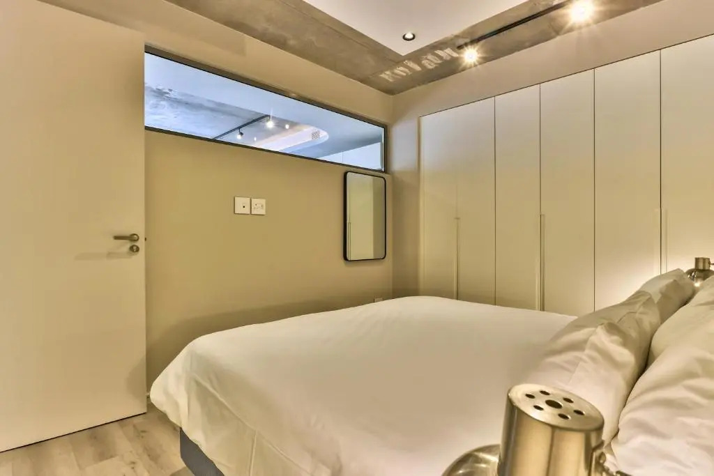 One Bedroom With Balcony and City Views