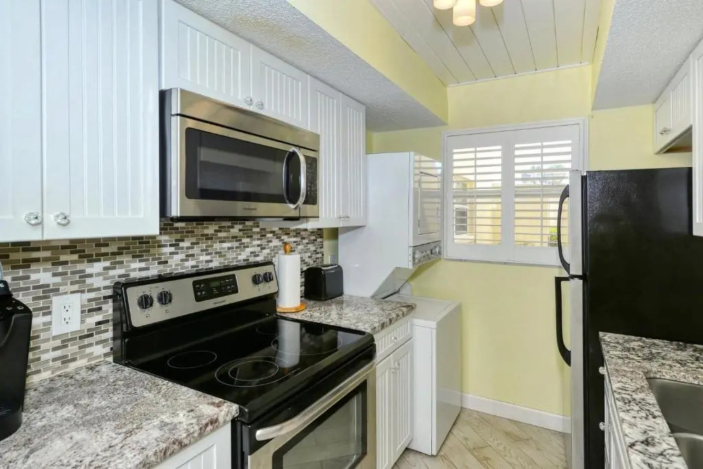 LaPlaya 105B-Relax on the balcony and watch the dolphins swim by and the pelicans dive!
