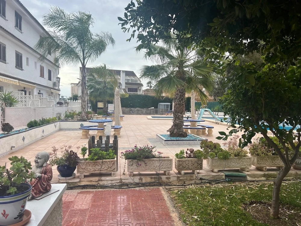 Charming 3-bedroom House With Shared Pool in Punta Prima, Torrevieja