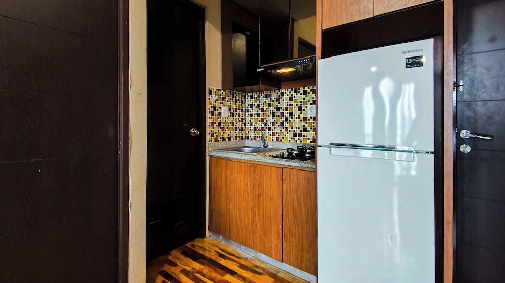 Modern 1Br With City View At Tamansari Papilio Apartment