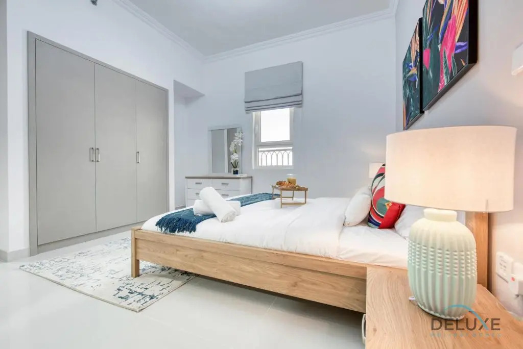 Vivid 2BR at Canal Residences West Dubai Sports City by Deluxe Holiday Homes