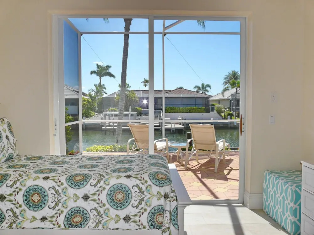 Pet-friendly waterfront home with heated pool and spa