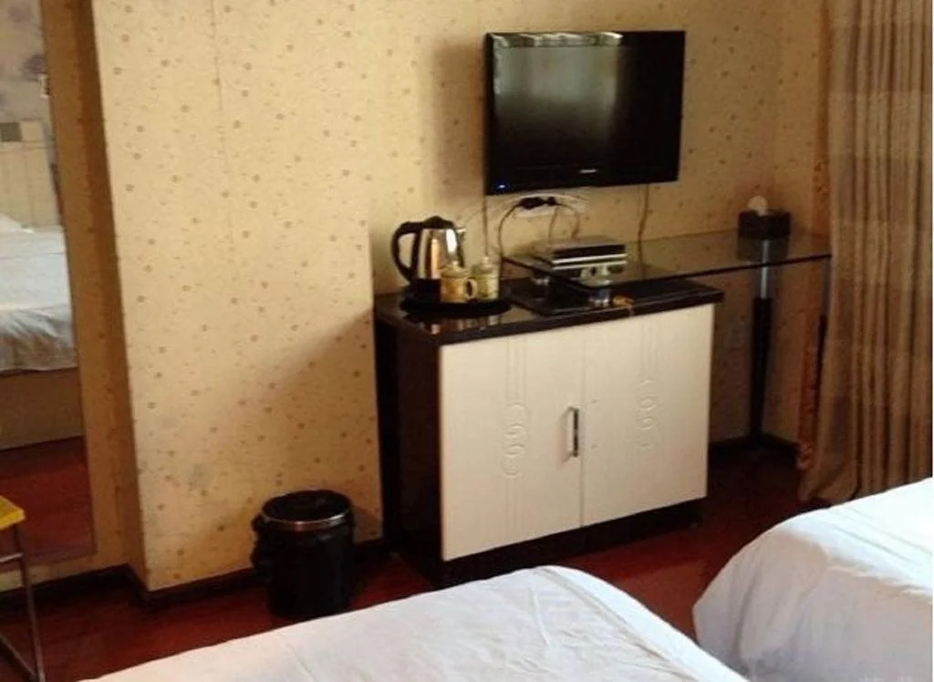 Beichuan Yijia Business Inn