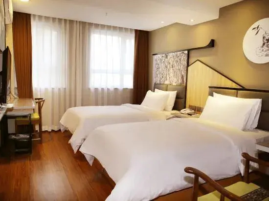Joy Susiness Hotel (Korla Tuanjie North Road Peacock River)