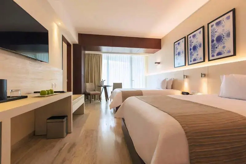 Двухместный номер Standard с частичным видом на океан (2 отдельные кровати) в Krystal Grand Cancun