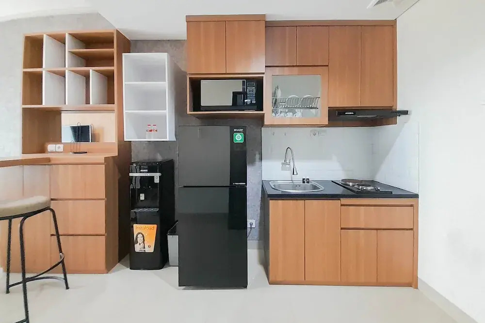 Elegant and Spacious 1BR at Patraland Amarta Apartment By Travelio