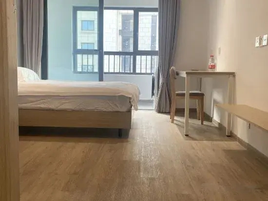 Milu Apartment (Shanghai Zhoupu Wanda Branch)