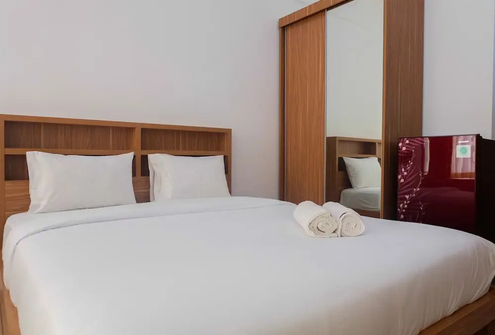 Brand New Compact Studio The Nest Puri Apartment By Travelio
