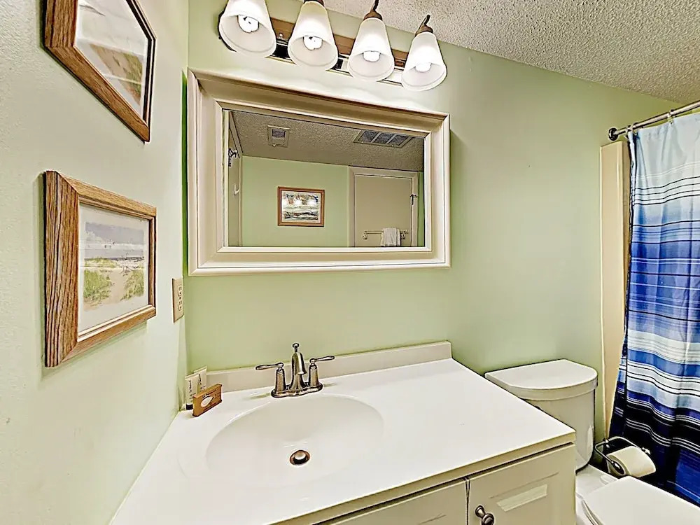 Oceanside Gem W/ Private Deck, Canal Views & Pools 2 Bedroom Condo