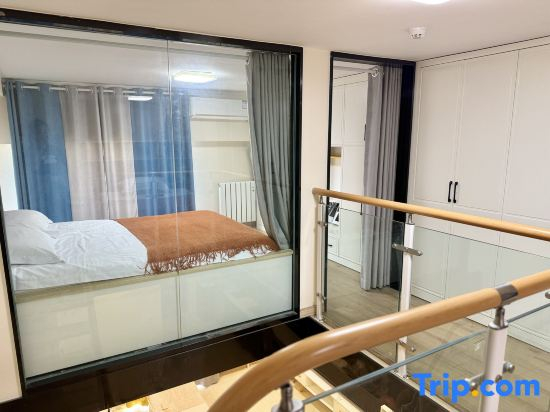 Mu'en Loft Light Luxury Apartment (Qingdao North Railway Station)