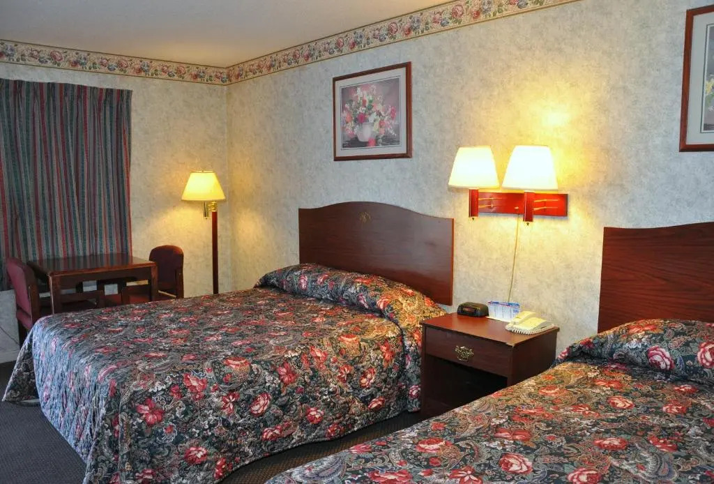 MERRIMAC INN & SUITES