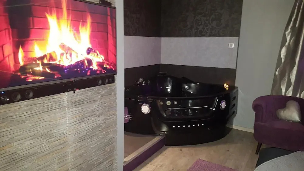 Appartement tout confort avec balnéo et lit king size