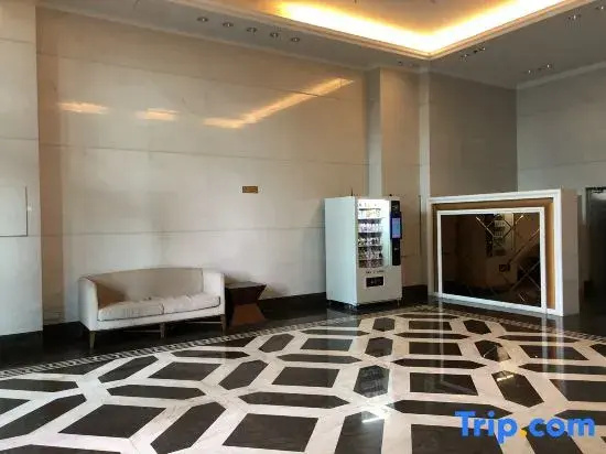 Haikou Bella Smart Apartment (International Convention and Exhibition Center Mengxiang Longteng Bay)