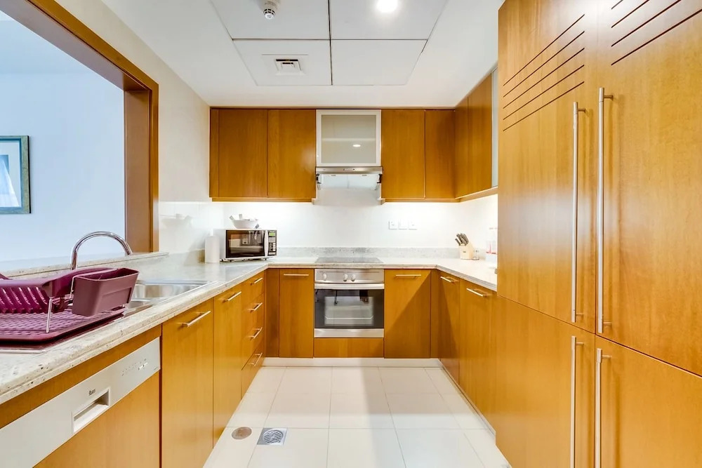 Skyline Serenity Holiday Home I Grande Signature 2 Bedroom Apartments I Persian Gulf Views I Free Parking, Gym, Pool & Wi-Fi
