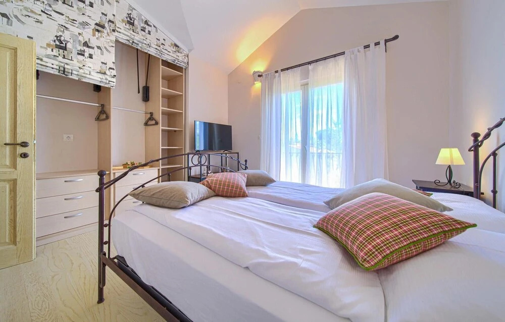 Stunning Home in Malinska With Wifi, Outdoor Swimming Pool and Heated Swimming Pool