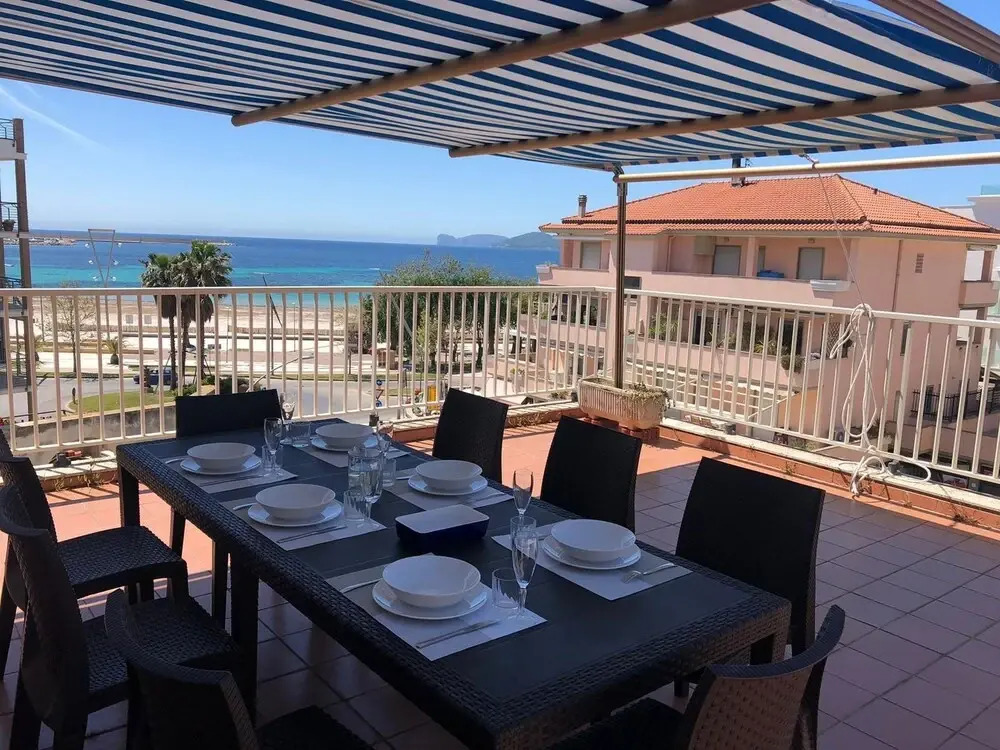 Alghero, Lighthouse Penthouse with sea view and beach front