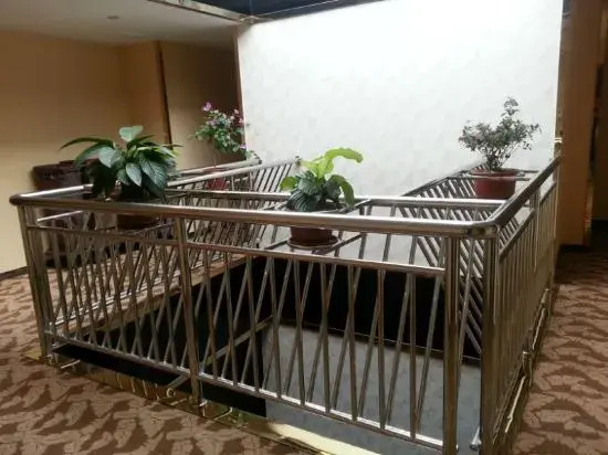 Xinmeijia Business Hotel (Huatian Town)