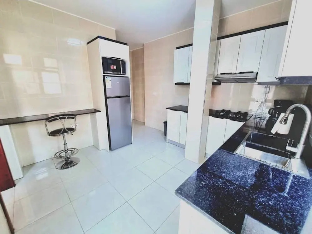 Q-Plus Apartments