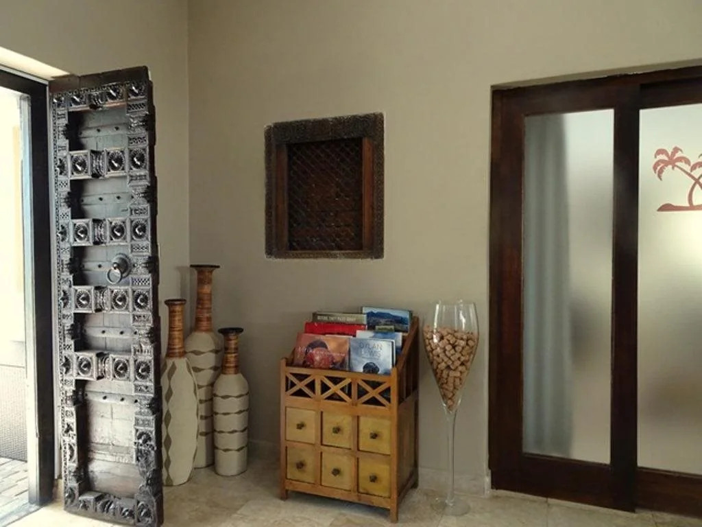 African Palm Cottage and Guesthouse