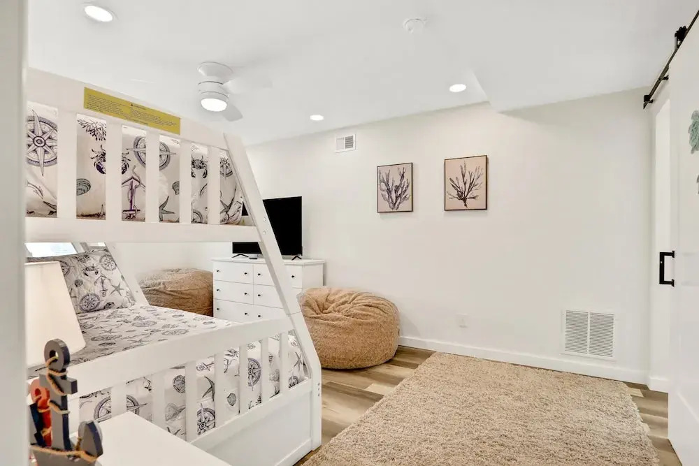 Updated Home Across From Beach With Covered Balcony, Central AC, & Washer/dryer