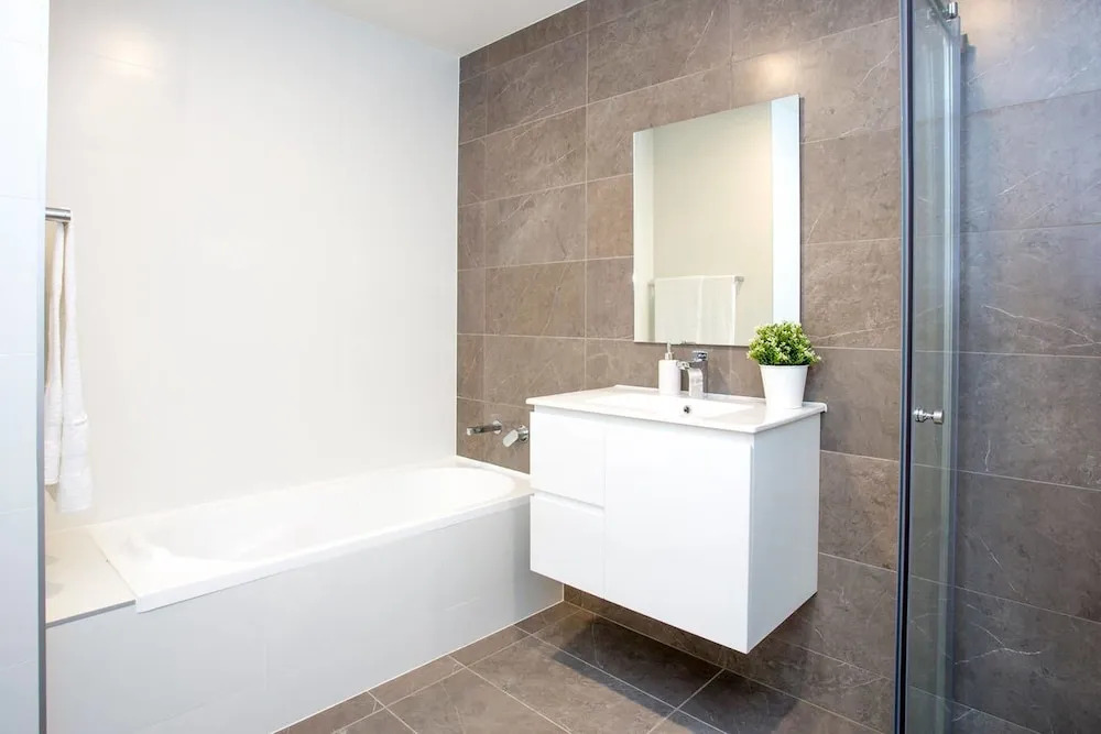 Designer Executive Apartment + Parking near Train