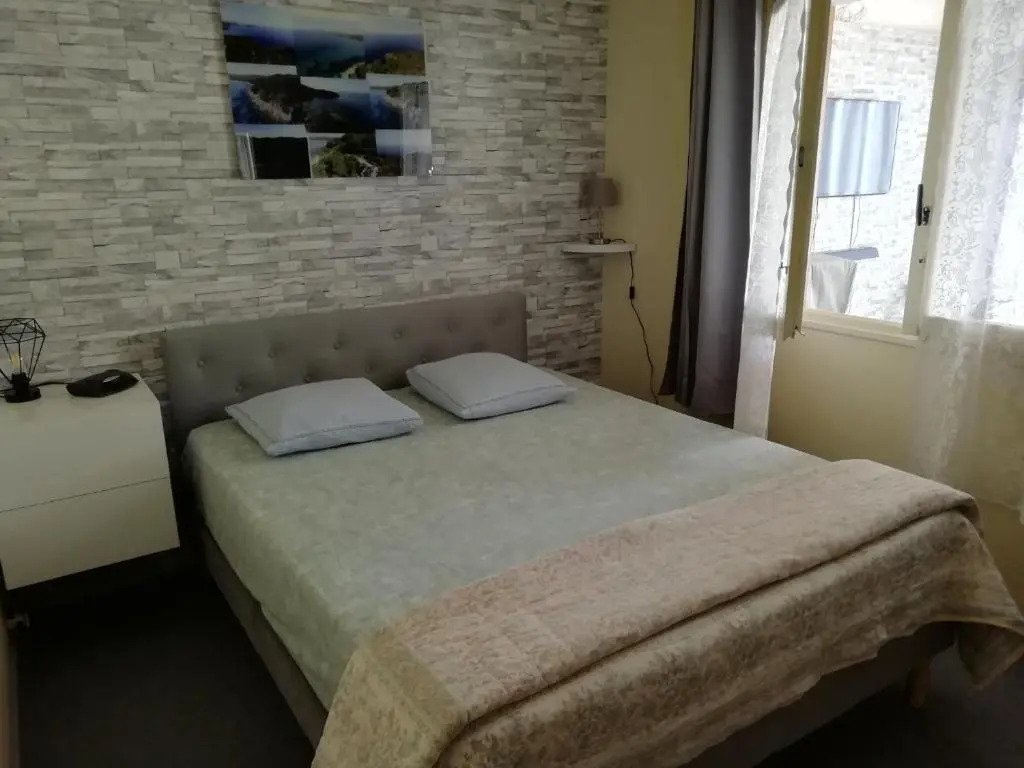 Appartement classé 3 étoiles au 1er étage dune maison avec jardin dans un quartier calme