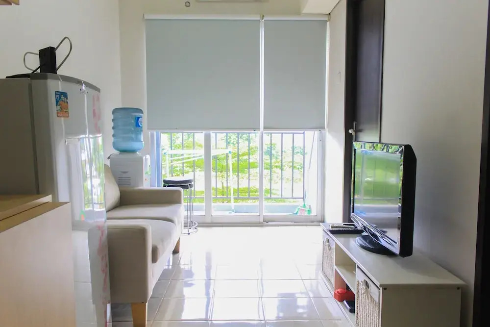 Comfy and Best View 2BR at Serpong Greenview Apartment By Travelio