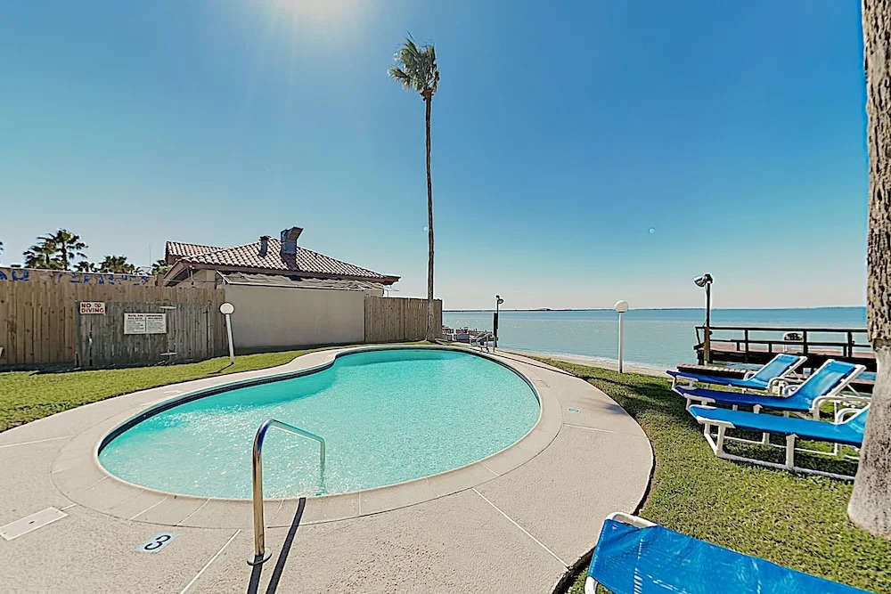 New Listing! Bay-view W/ Pool, Walk To Beach 2 Bedroom Condo