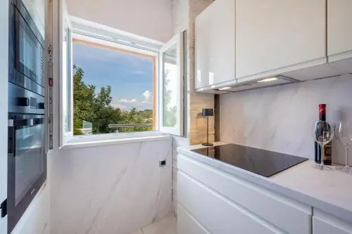Uniquely designed Villa Ivana with outdoor Jacuzzi nearby the pebble Banje beach at the Island of Solta