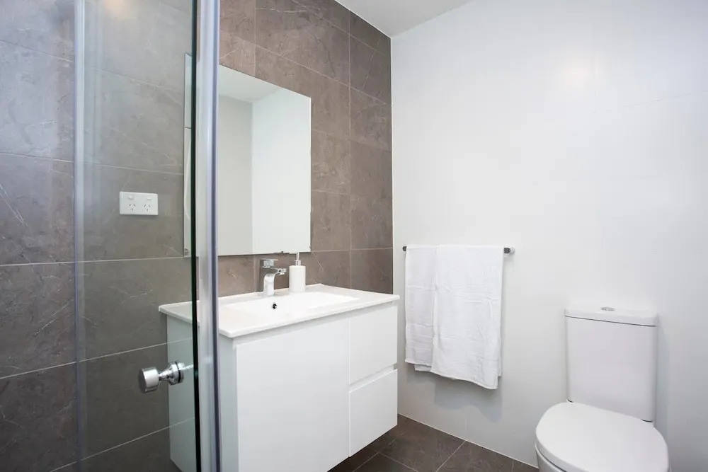 Designer Executive Apartment + Parking near Train
