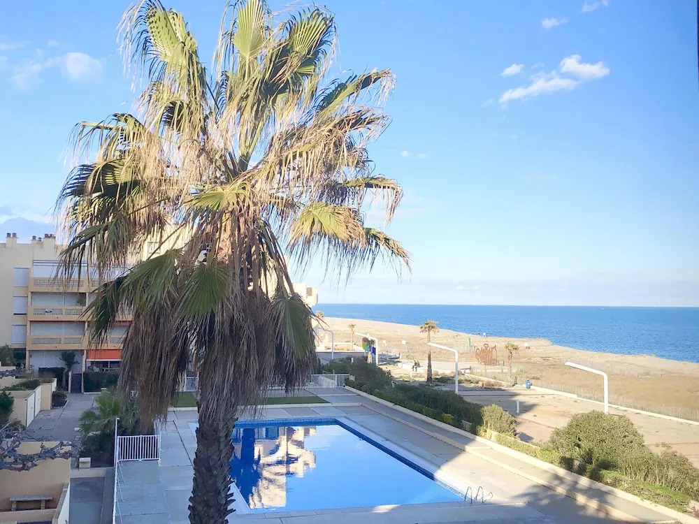 Magnifique T2 piscine mer wifi clim parking