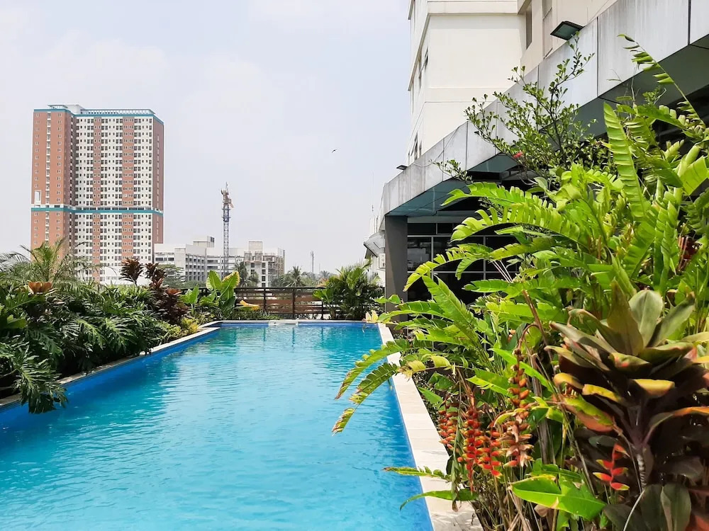 Cozy 2BR Apartment at Tuscany Residences With Garden View