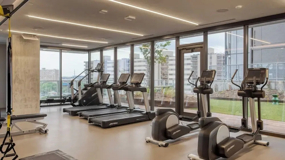 2 Luxury Condos, 1 Block From Rainey St New High Rise w/ Rooftop Pool & Gym