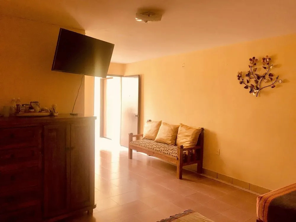 Capital O Las Calzadas Hotel & Suites