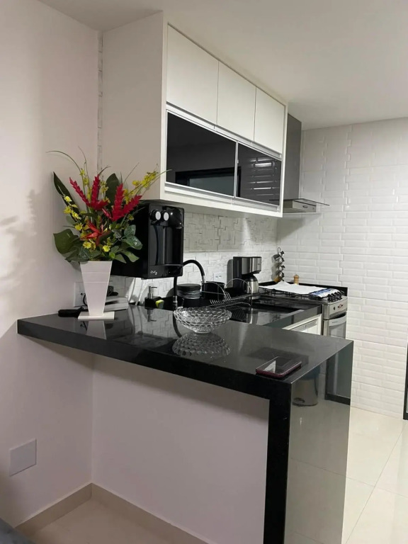 Apartamento moderno e super confortável localizado a alguns passos da Praia Grande