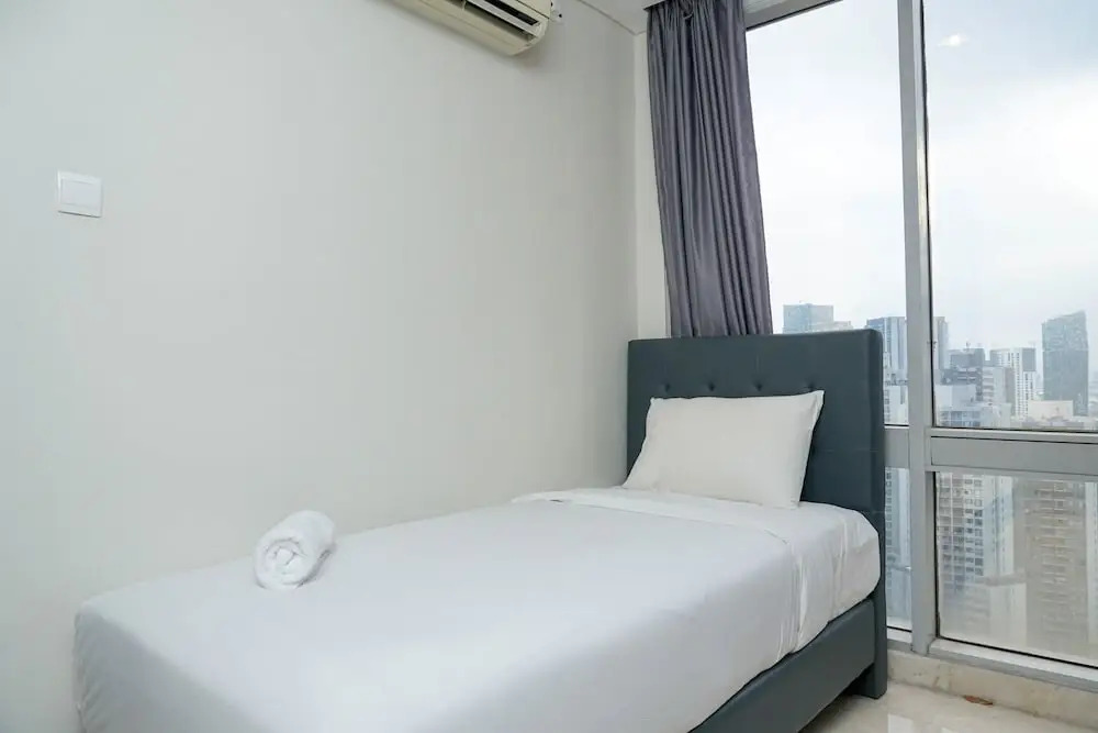Elegant 2BR at The Empyreal Condominium Epicentrum Apartment