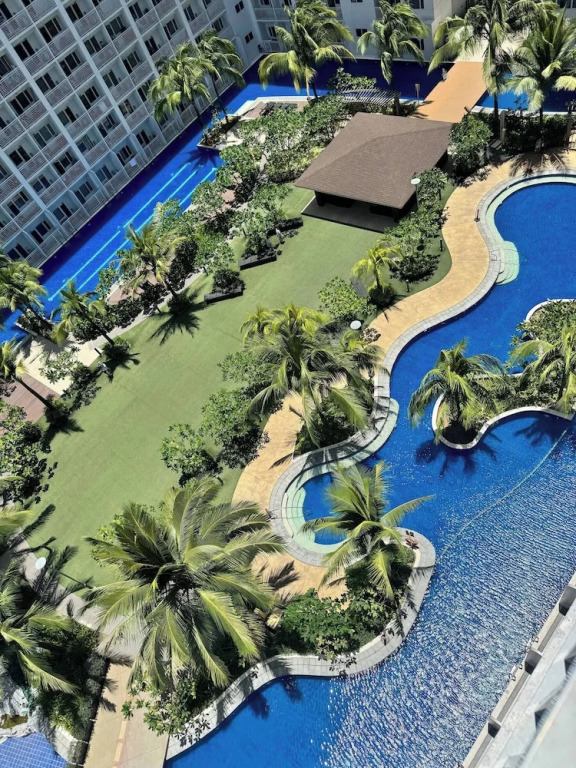 Relax in Pasay City's Best Kept Secret - Spacious Condo With Garden View