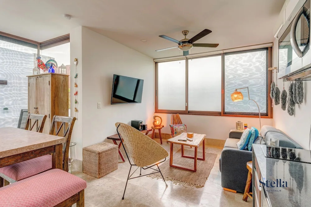 Private Rooftop 1BR Condo with Stunning Common Areas by Stella Rentals
