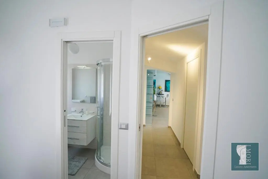 "I MORI LUXORY APARTMENTS" - Attico mansardato con incantevole vista mare